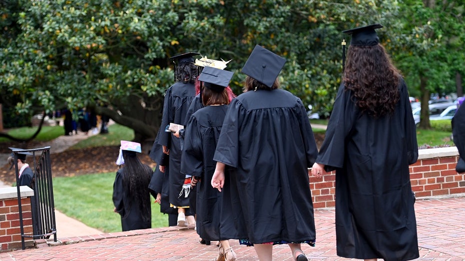 college graduates walking away